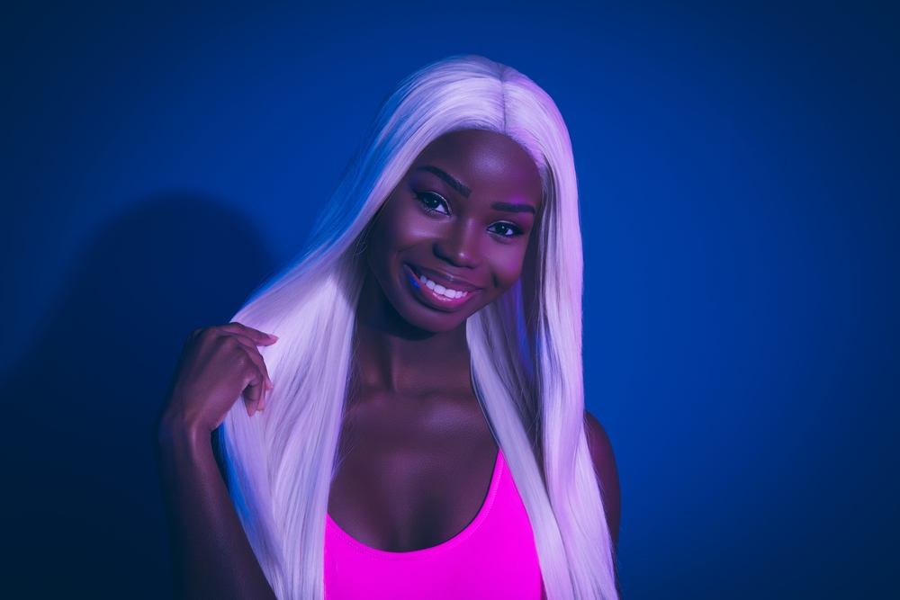 Black with with platinum white hair, one of the best hair colors for dark skin
