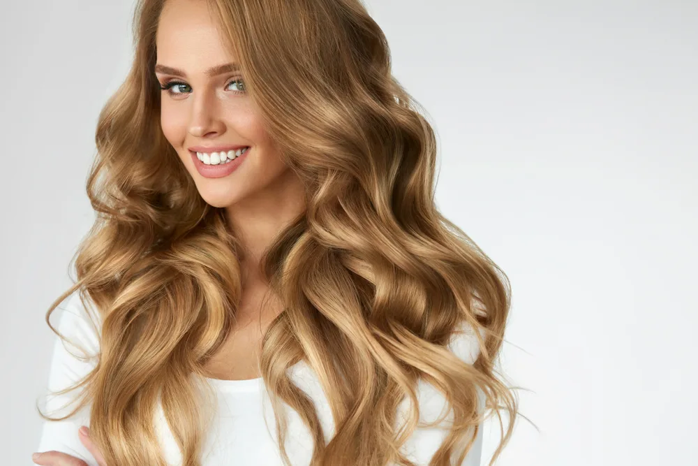 Medium Golden Blonde, a top pick for the best hair colors for tan skin