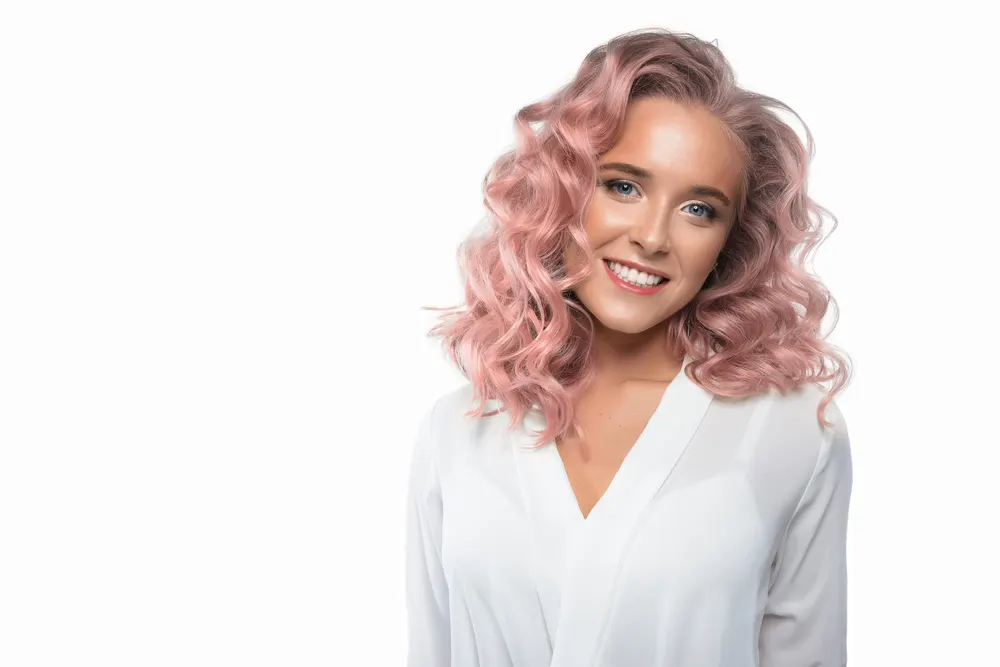 Dusty Rose Gold, one of the best hair colors for curly hair