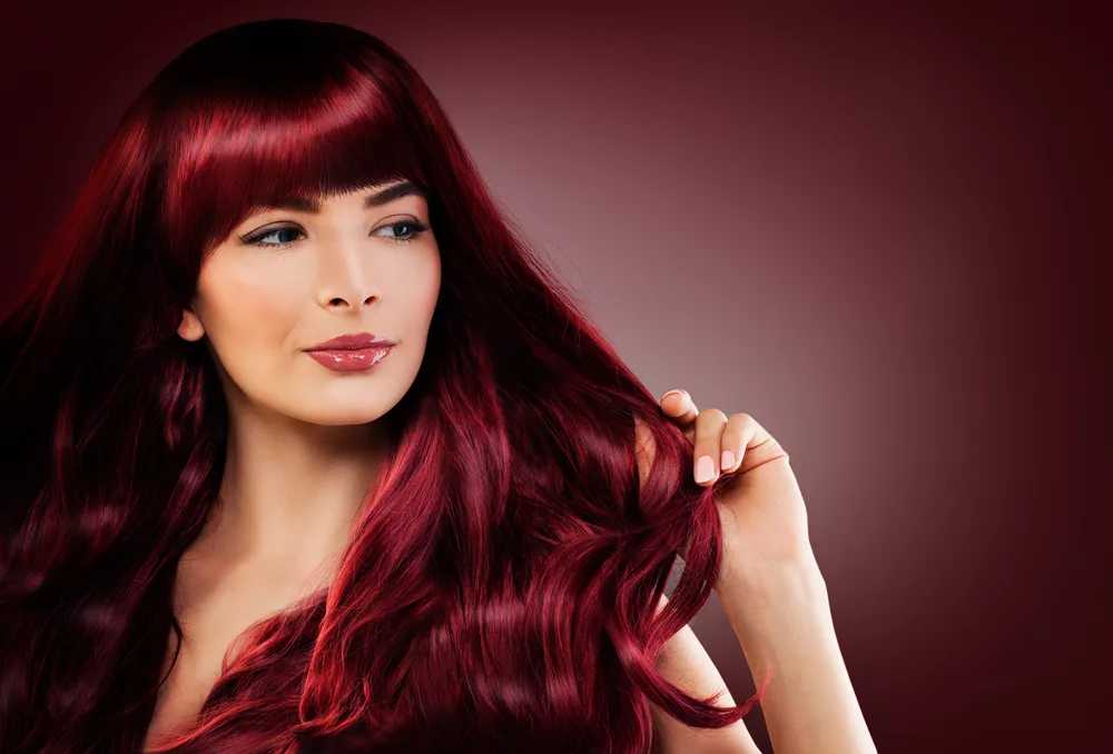 Dark Maroon hair color for a piece on the best hair colors for red hair