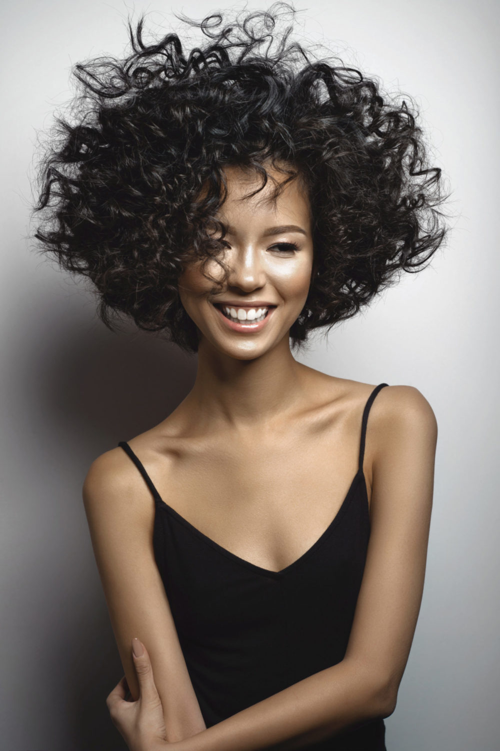 Shiny Soft Black, one of the best hair colors for curly hair