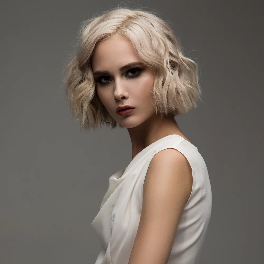 Trendy Champagne Blonde Wavy Bob, one of our favorite short blonde hairstyles