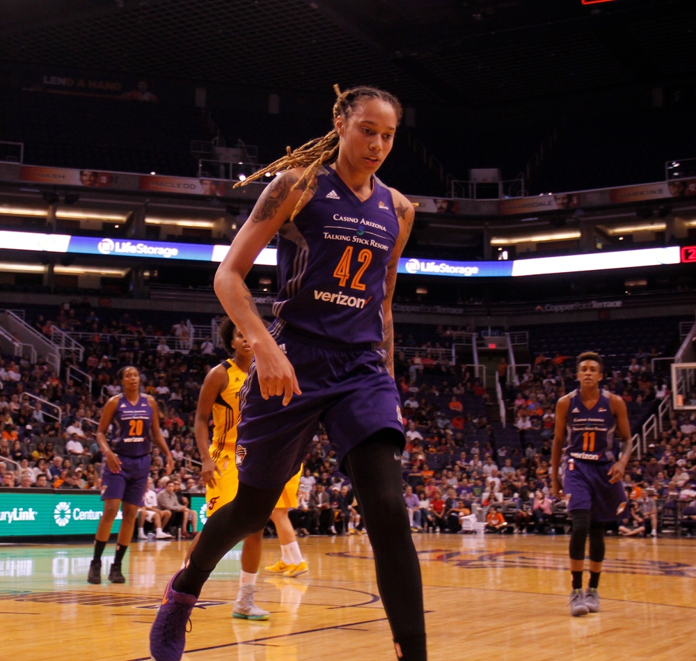 Action shot of basketball player Brittney Griner haircut before chopping her long dreads