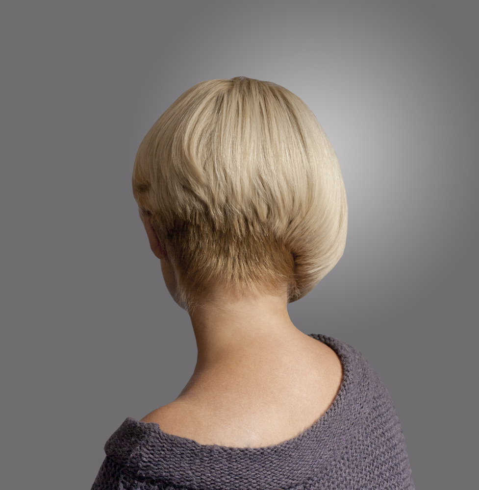 Woman with a Asymmetrical Tapered Golden Blonde Bixie (a great hairstyle for women with short blonde hair)